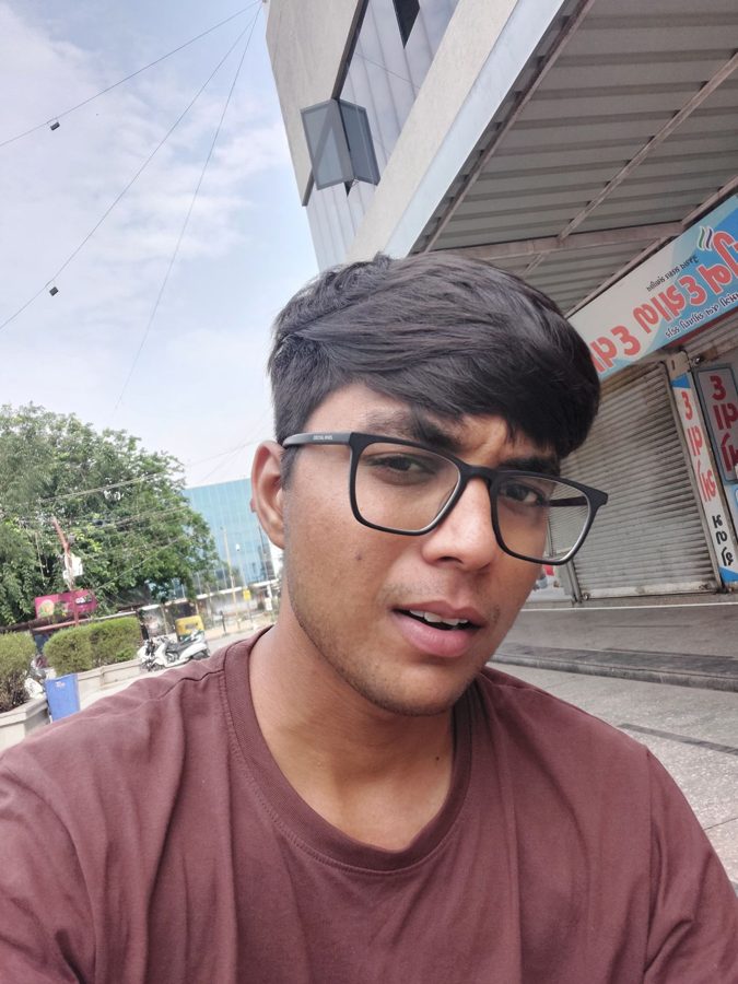 Selfie of Jaivik in a maroon tee