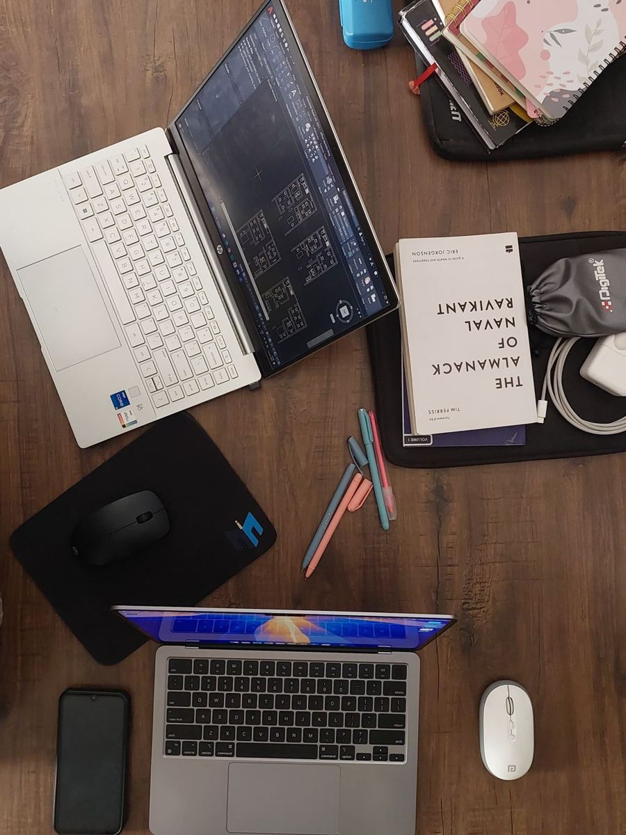 My desk: laptops, notebooks and books
