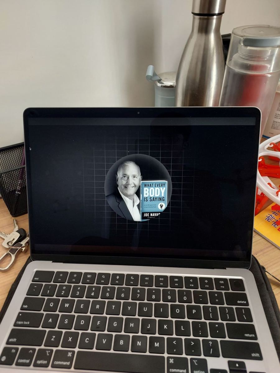 Laptop and water bottle, mid-session